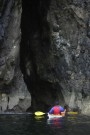 Luke Vanishing Into A Sea Cave, Skye